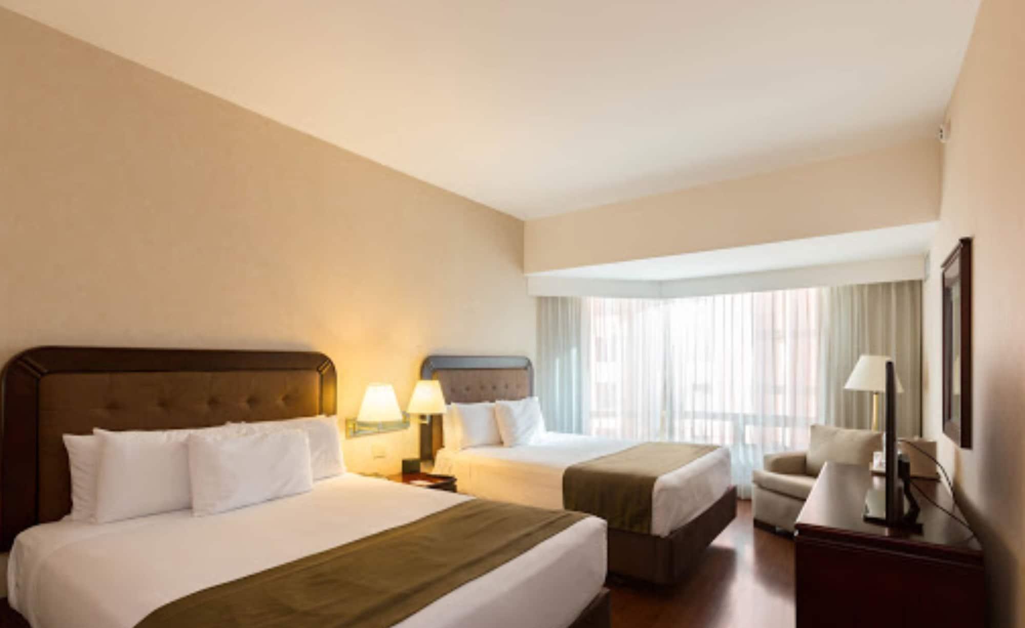 Clarion Suites Guatemala City Exterior photo A room at the hotel