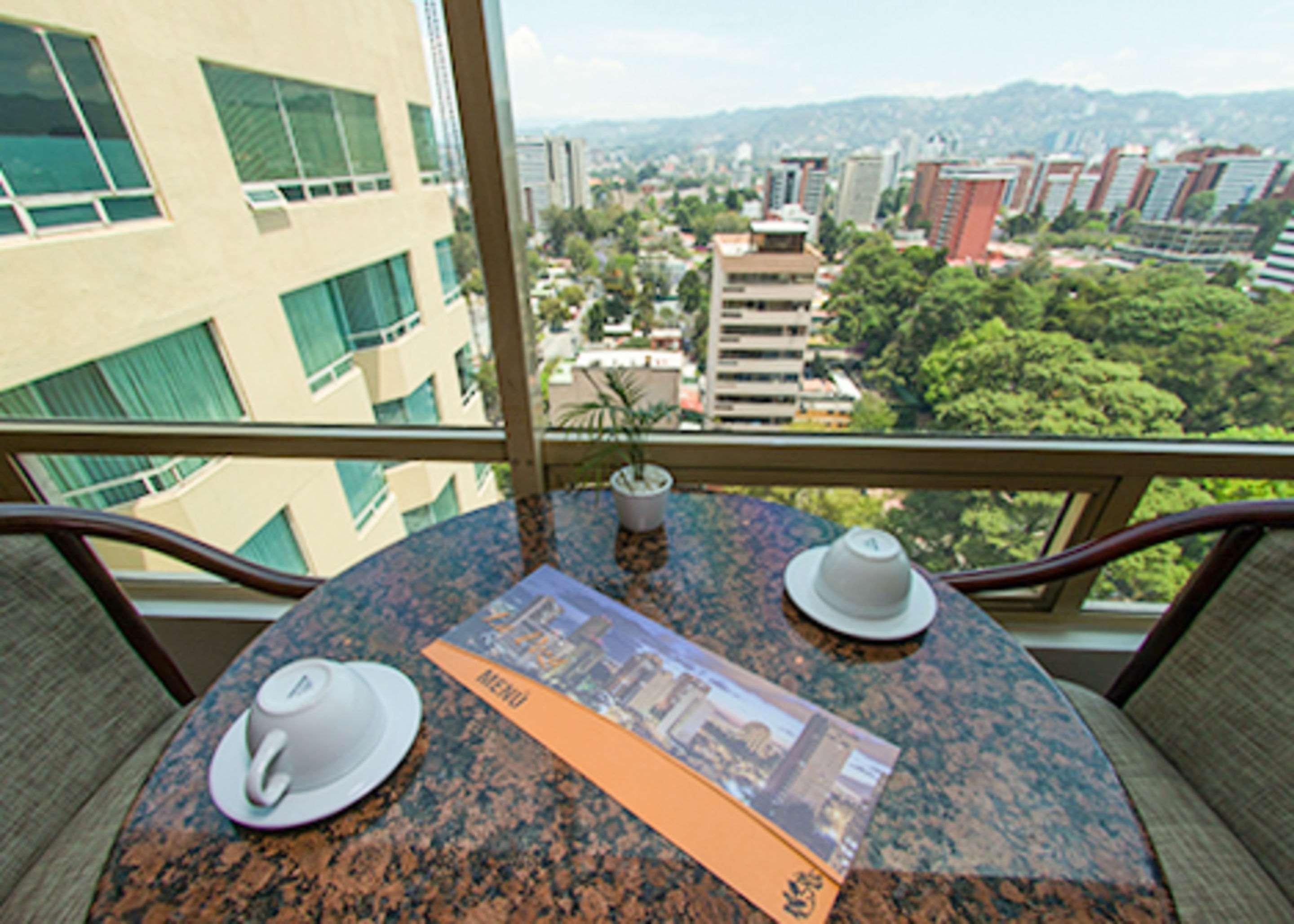 Clarion Suites Guatemala City Exterior photo A view from a balcony