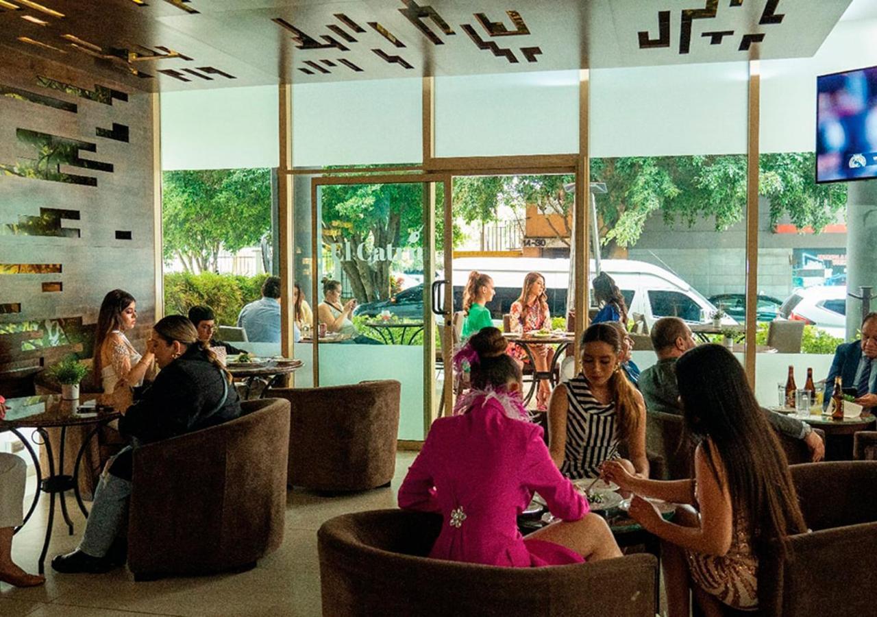 Clarion Suites Guatemala City Exterior photo Interior of a café in Yerevan